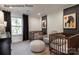 Charming bedroom with two cribs, neutral decor, and natural light at 3535 Rapport Ct # 023, Lancaster, SC 29720