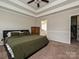 King-size bed, en-suite bathroom access, and large closet at 364 Holstein Dr, Dallas, NC 28034