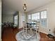 Cozy dining area features a round table with four chairs and hardwood floors at 364 Holstein Dr, Dallas, NC 28034