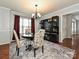 Dining room featuring a built-in bar and a round dining table at 364 Holstein Dr, Dallas, NC 28034