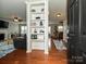 Bright entryway with built-in shelving and hardwood floors at 364 Holstein Dr, Dallas, NC 28034