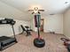 Home gym with treadmill, weight bench, and punching bag at 364 Holstein Dr, Dallas, NC 28034
