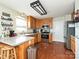 Spacious kitchen featuring ample cabinetry, stainless steel appliances, and hardwood floors at 364 Holstein Dr, Dallas, NC 28034
