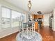 Bright kitchen with oak cabinets, stainless steel appliances, and breakfast nook at 364 Holstein Dr, Dallas, NC 28034