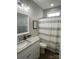 Clean bathroom with shower/tub, granite countertop and updated fixtures at 401 Fourth St, Stanley, NC 28164