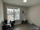 Bright bedroom with window, workspace and hardwood floors at 401 Fourth St, Stanley, NC 28164