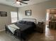 Spacious bedroom with a king-size bed and en-suite bathroom at 401 Fourth St, Stanley, NC 28164