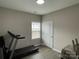 Small exercise room with treadmill and window at 401 Fourth St, Stanley, NC 28164