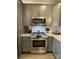 Modern kitchen with stainless steel range and microwave at 401 Fourth St, Stanley, NC 28164