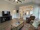 Open concept living room with hardwood floors and a view of the kitchen at 401 Fourth St, Stanley, NC 28164