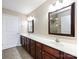 Spacious bathroom featuring a double sink vanity and large mirror at 4723 Polo Gate Blvd, Charlotte, NC 28216