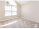Bedroom with neutral walls, carpet, a window with blinds, and natural light at 4723 Polo Gate Blvd, Charlotte, NC 28216