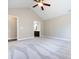 Empty bedroom featuring a neutral color scheme and a doorway to the bathroom at 4723 Polo Gate Blvd, Charlotte, NC 28216