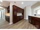 A spacious butler pantry with rich wood cabinetry and stainless steel appliances at 4723 Polo Gate Blvd, Charlotte, NC 28216