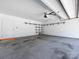 Clean, spacious garage with black shelving and ample room for vehicles and storage at 4723 Polo Gate Blvd, Charlotte, NC 28216