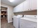 Laundry room with a stainless steel sink, and washer and dryer at 4723 Polo Gate Blvd, Charlotte, NC 28216