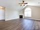 Spacious living room with hardwood floors, fireplace and vaulted ceiling at 4723 Polo Gate Blvd, Charlotte, NC 28216