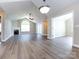 Open concept living area with hardwood floors and high ceilings at 4723 Polo Gate Blvd, Charlotte, NC 28216