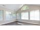 Sunroom with vaulted ceiling and numerous windows at 4723 Polo Gate Blvd, Charlotte, NC 28216