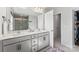 Bright bathroom featuring double sink vanity, spacious countertops, and a large glass-enclosed shower at 5034 Moselle Ave, Fort Mill, SC 29707