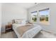 Cozy bedroom with neutral decor, two windows, and a comfortable bed at 5034 Moselle Ave, Fort Mill, SC 29707