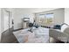 Versatile home gym with exercise equipment, TV, and a comfortable seating area at 5034 Moselle Ave, Fort Mill, SC 29707