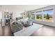 Bright open living space with hardwood flooring and large windows with natural light at 5034 Moselle Ave, Fort Mill, SC 29707