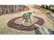 Aerial view of a well-maintained green playset with slides and climbing structures surrounded by mulch and a sidewalk at 5034 Moselle Ave, Fort Mill, SC 29707