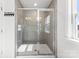 Modern bathroom featuring a spacious shower with glass doors and tiled walls at 5034 Moselle Ave, Fort Mill, SC 29707