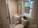 Clean bathroom with a pedestal sink and updated toilet at 514 S Spruce St, Rock Hill, SC 29730