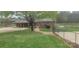 Exterior back view of home featuring deck and fenced yard at 5527 Dallas High Shoals Hwy Hwy, Dallas, NC 28034