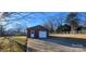 Brick detached garage with driveway and yard access at 5527 Dallas High Shoals Hwy Hwy, Dallas, NC 28034
