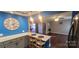 Open concept kitchen with breakfast bar and views into the living room at 5527 Dallas High Shoals Hwy Hwy, Dallas, NC 28034