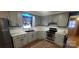 Updated kitchen with gray cabinets and stainless steel appliances at 5527 Dallas High Shoals Hwy Hwy, Dallas, NC 28034
