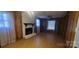 Living room features a fireplace and hardwood floors at 5527 Dallas High Shoals Hwy Hwy, Dallas, NC 28034