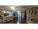 Spacious living room with hardwood floors and kitchen view at 5527 Dallas High Shoals Hwy Hwy, Dallas, NC 28034
