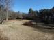 Large backyard with mature trees and open space at 5590 S Nc 16 Business Hwy, Maiden, NC 28650