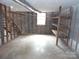 Unfinished basement with exposed studs and block walls at 5590 S Nc 16 Business Hwy, Maiden, NC 28650