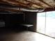 Basement with sliding glass door to outdoors, bare ceiling, exposed utilities, and concrete flooring at 5590 S Nc 16 Business Hwy, Maiden, NC 28650