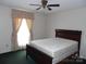 Bedroom with a queen bed, ceiling fan, and window at 5590 S Nc 16 Business Hwy, Maiden, NC 28650