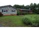Ranch home with a separate shed and landscaping at 5590 S Nc 16 Business Hwy, Maiden, NC 28650