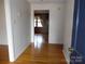 Clean hallway with hardwood floors at 5590 S Nc 16 Business Hwy, Maiden, NC 28650
