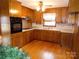 Classic kitchen with wood cabinets and appliances at 5590 S Nc 16 Business Hwy, Maiden, NC 28650