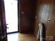 Laundry room with exterior access and wood paneling at 5590 S Nc 16 Business Hwy, Maiden, NC 28650