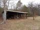 Rustic storage shed with covered area for equipment at 5590 S Nc 16 Business Hwy, Maiden, NC 28650