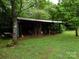 Large storage shed with covered area for equipment at 5590 S Nc 16 Business Hwy, Maiden, NC 28650