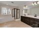 Spacious bathroom featuring a large tub, walk-in shower, double vanity and natural light at 5954 Rathlin Nw Ct, Concord, NC 28027