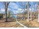 Lakefront property with a relaxing seating area and walkway at 604 Beaten Path, Mooresville, NC 28117