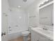 Clean bathroom with a white vanity, shower/tub combo, and updated fixtures at 604 Beaten Path, Mooresville, NC 28117