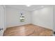 Bright bedroom with hardwood floors and a view at 604 Beaten Path Rd, Mooresville, NC 28117